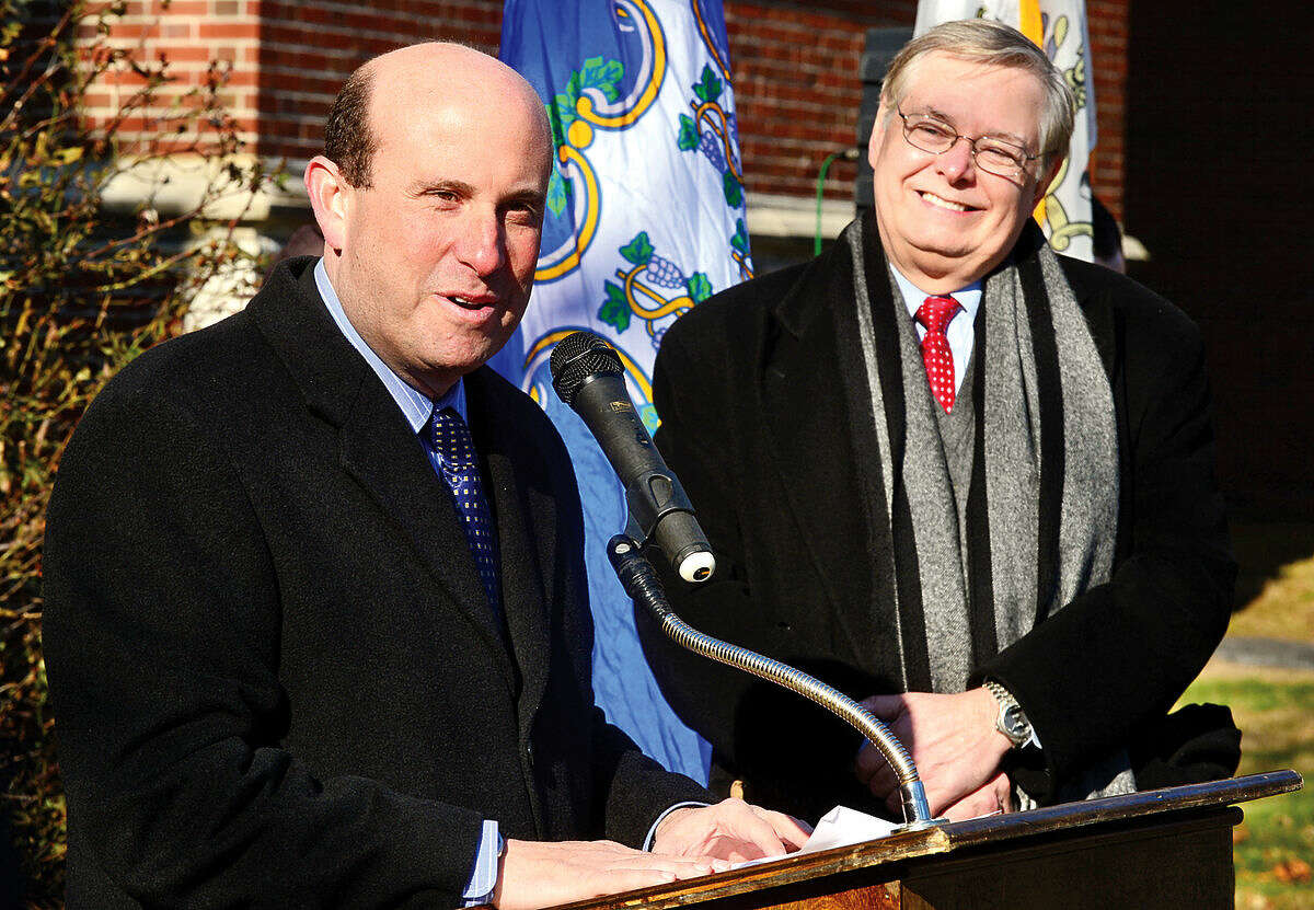 Hour photo / Erik Trautmann Stamford Mayor David Martin is joined by Board of Education president Geoff Alswanger who speaks during the groundbreaking ceremony of a new school at the site of the former Sacred Heart Academy Thursday morning.