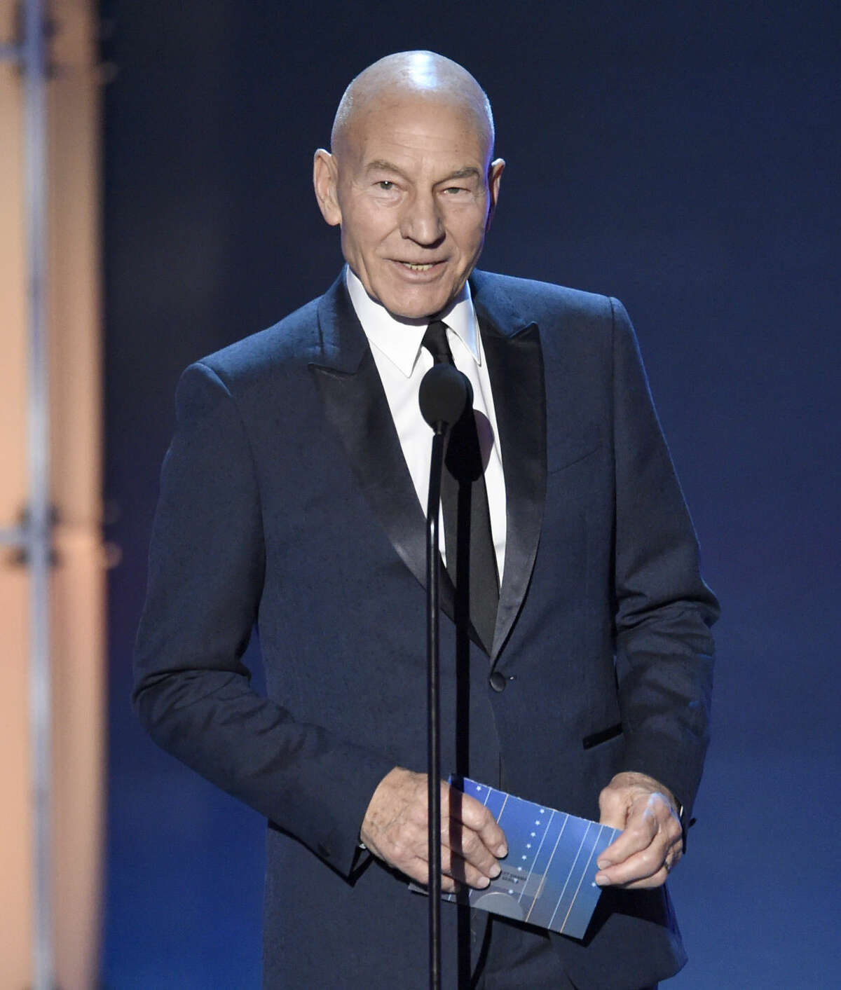 Sir Patrick Stewart presents the award for best drama series at the 21st annual Critics' Choice Awards at the Barker Hangar on Sunday, Jan. 17, 2016, in Santa Monica, Calif. (Photo by Chris Pizzello/Invision/AP)