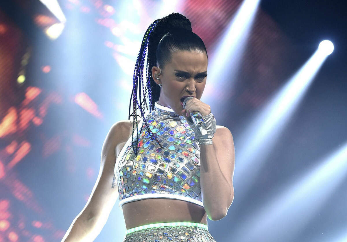 FILE - In this Sept. 16, 2014 file photo, Katy Perry performs on stage at "The Prismatic World Tour" at the Honda Center in Anaheim, Calif. Perry will team with Lenny Kravitz at the Super Bowl. Perry said Saturday, Jan. 10, 2015, on NBC's Baltimore-New England telecast that Kravitz will join for the halftime show at the Sunday, Feb. 1, game in Glendale, Ariz. (Photo by John Shearer/Invision/AP, File)