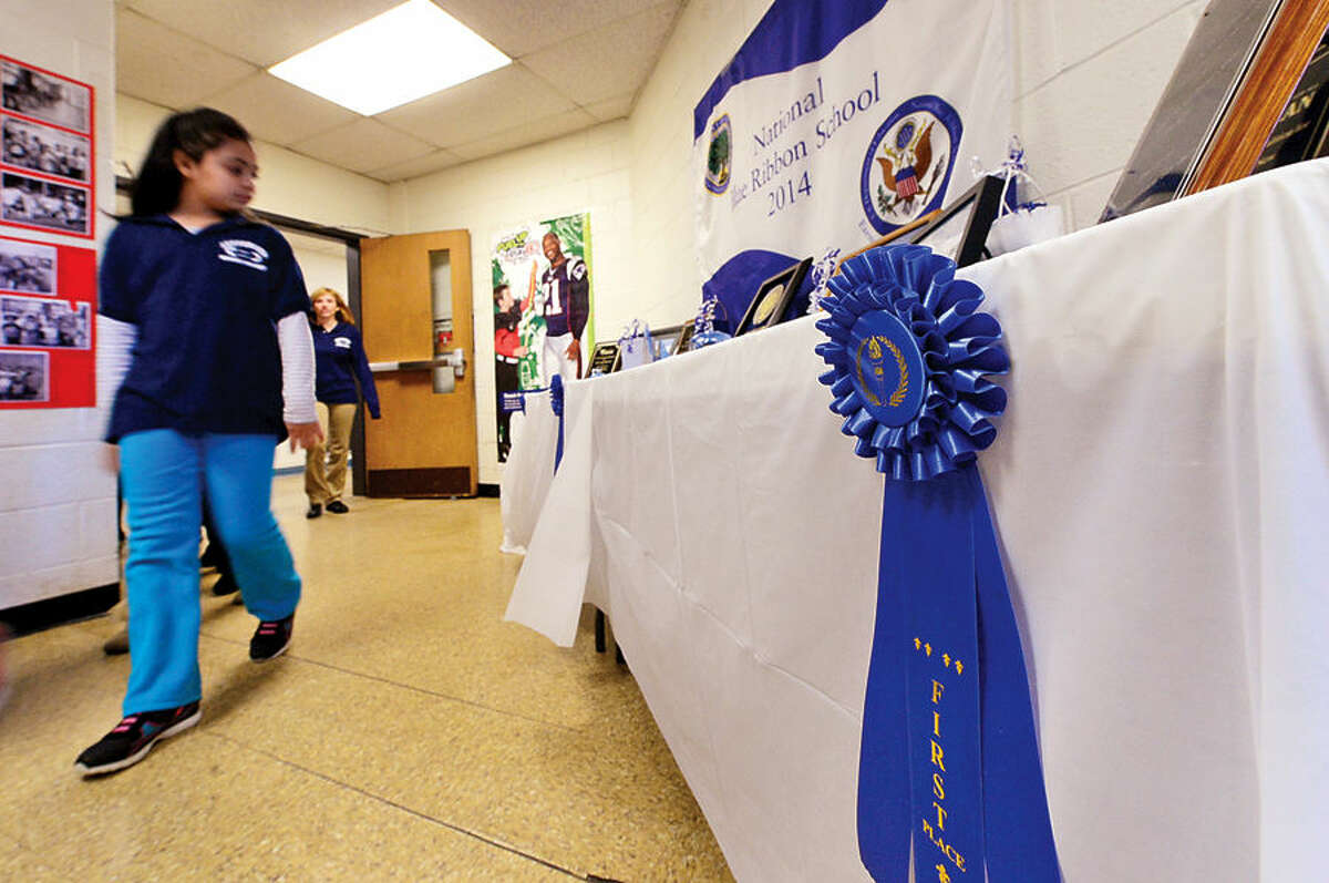 Hour photo / Erik Trautmann Jefferson Science Magnet School celebrates the National Blue Ribbon Award they received for closing the achievement gap between student sub-groups during a ceremony Tuesday morning.