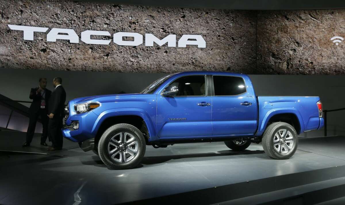 The new Toyota Tacoma truck is unveiled during the North American International Auto Show, Monday, Jan. 12, 2015 in Detroit. (AP Photo/Carlos Osorio)