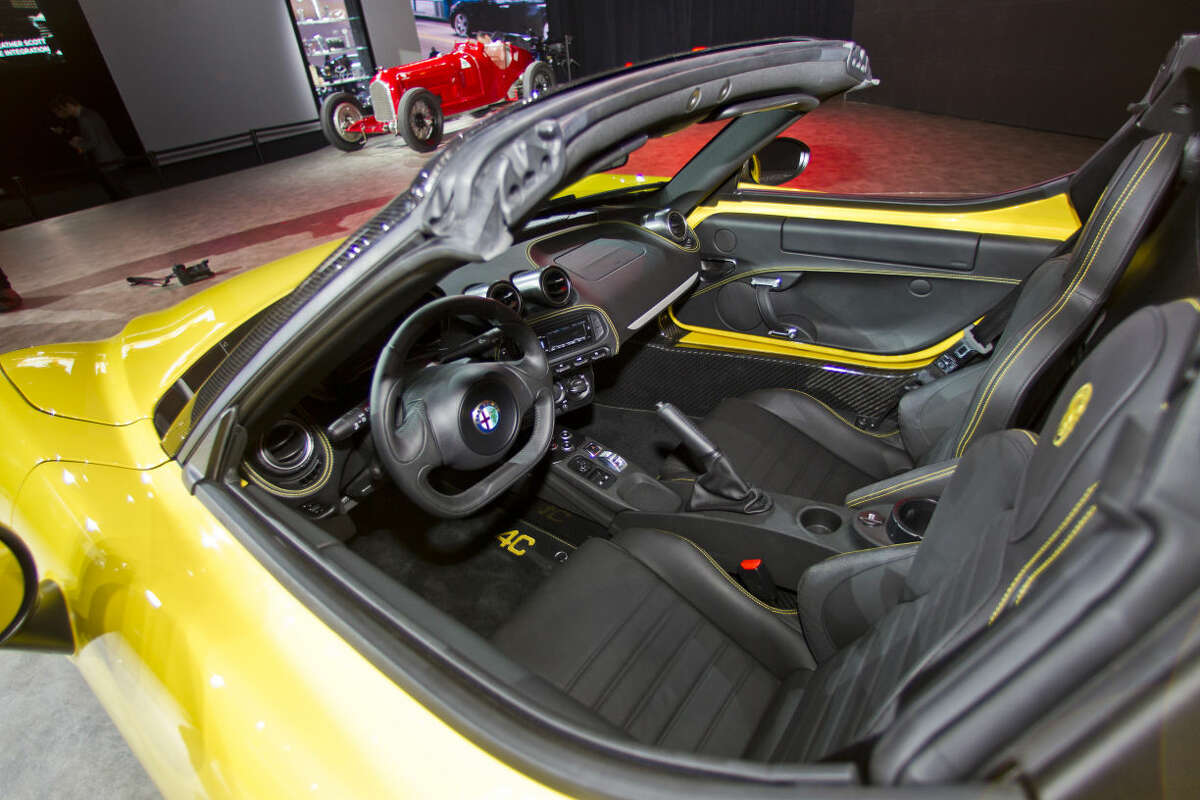 An interior view of an Alfa Romeo 4C Spider convertible, on display at the North American International Auto Show, Monday, Jan. 12, 2015, in Detroit. (AP Photo/Tony Ding)