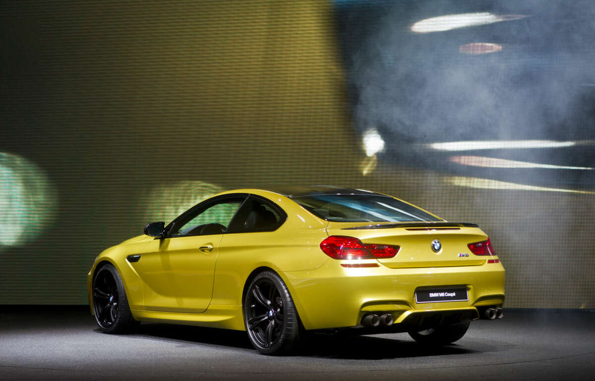 The BMW M6 coupe is unveiled at the North American International Auto Show, Monday, Jan. 12, 2015, in Detroit. (AP Photo/Tony Ding)