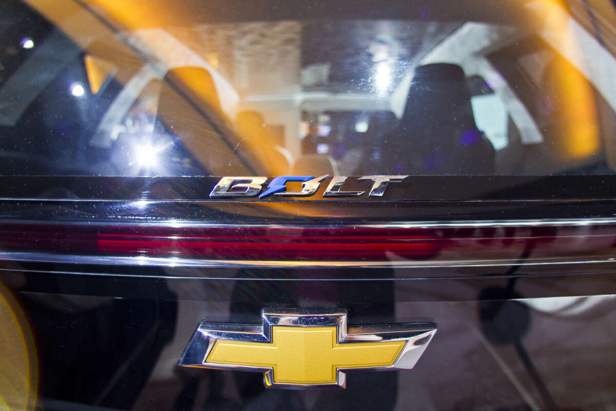The rear hatch of the Chevrolet Bolt EV electric concept vehicle, featuring two-piece glass panels, on display during the North American International Auto Show, Monday, Jan. 12, 2015, in Detroit. (AP Photo/Tony Ding)