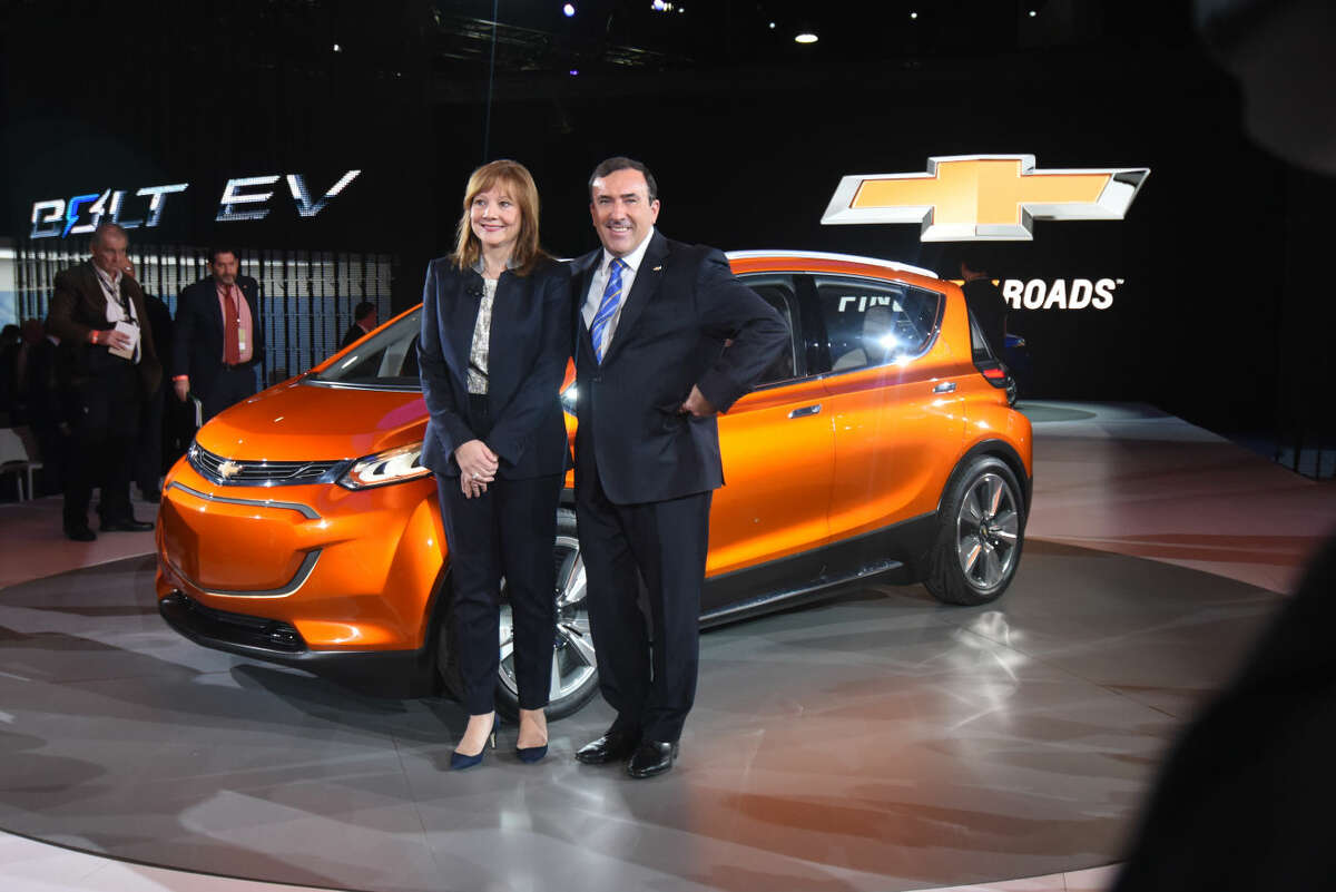 General Motors Chief Executive Officer Mary Barra and Executive Vice President and President of North America Alan Batey introduce the 2016 Chevrolet Volt at the North American International Auto Show in Cobo Center in Downtown Detroit Monday Jan. 12, 2015. (AP Photo/The Grand Rapids Press, Tanya Moutzalia)