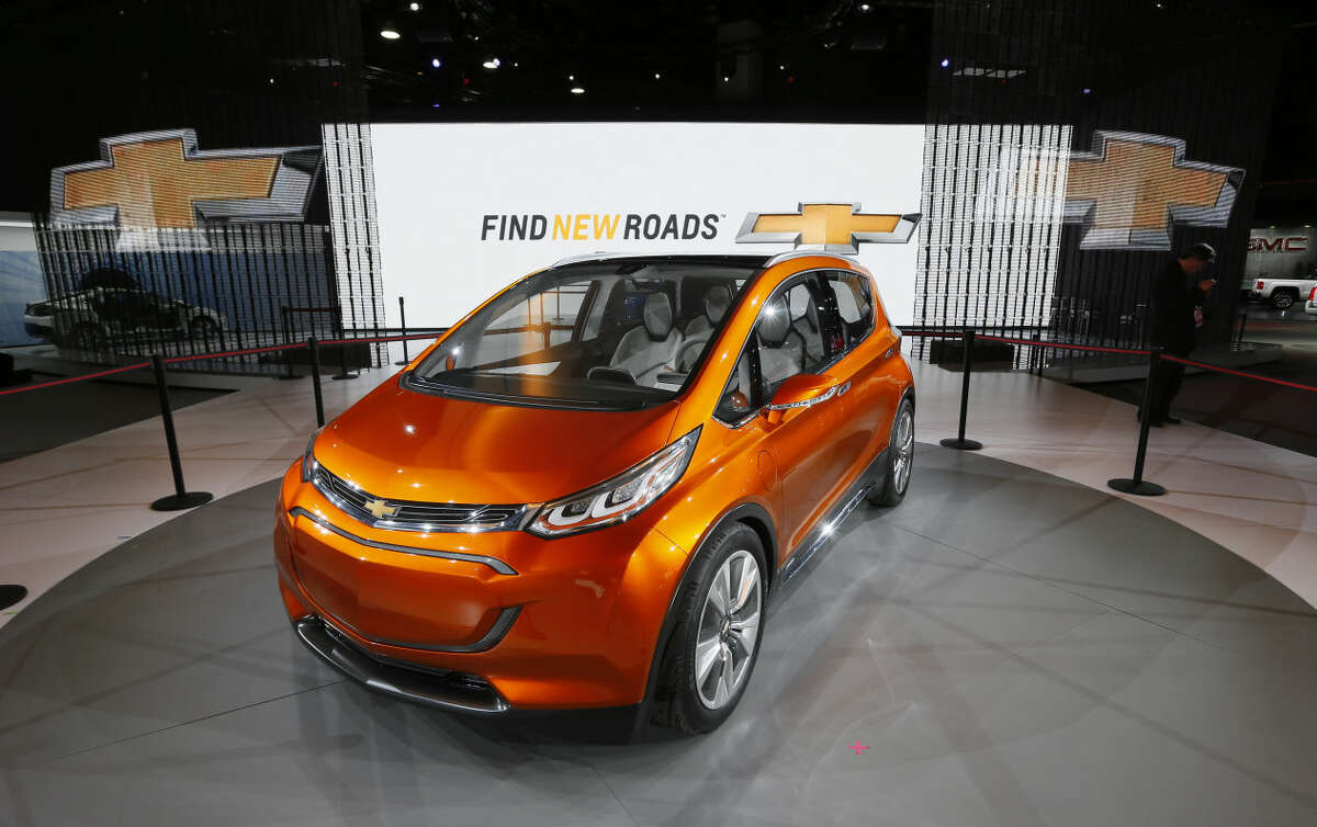 The Chevrolet Bolt is on display during media previews for the North American International Auto Show in Detroit, Tuesday, Jan. 13, 2015. (AP Photo/Paul Sancya)