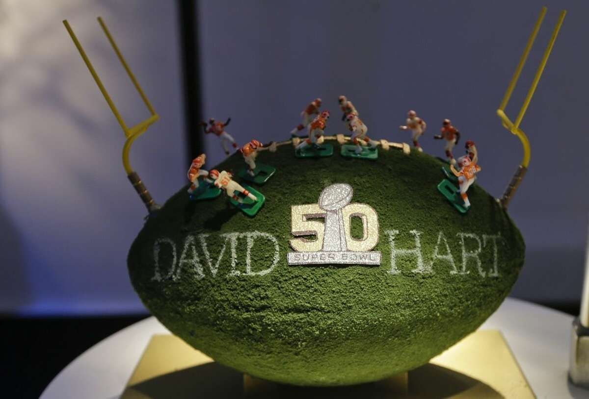A David Hart designed football is displayed at the unveiling of the CFDA Footballs Wednesday, Jan. 20, 2016, at the NFL headquarters in New York. In celebration of Super Bowl 50 and in support of the NFL Foundation, the NFL and the Council of Fashion Designers of America have collaborated on 50 Bespoke Designer Footballs created by CFDA Members. (AP Photo/Frank Franklin II)