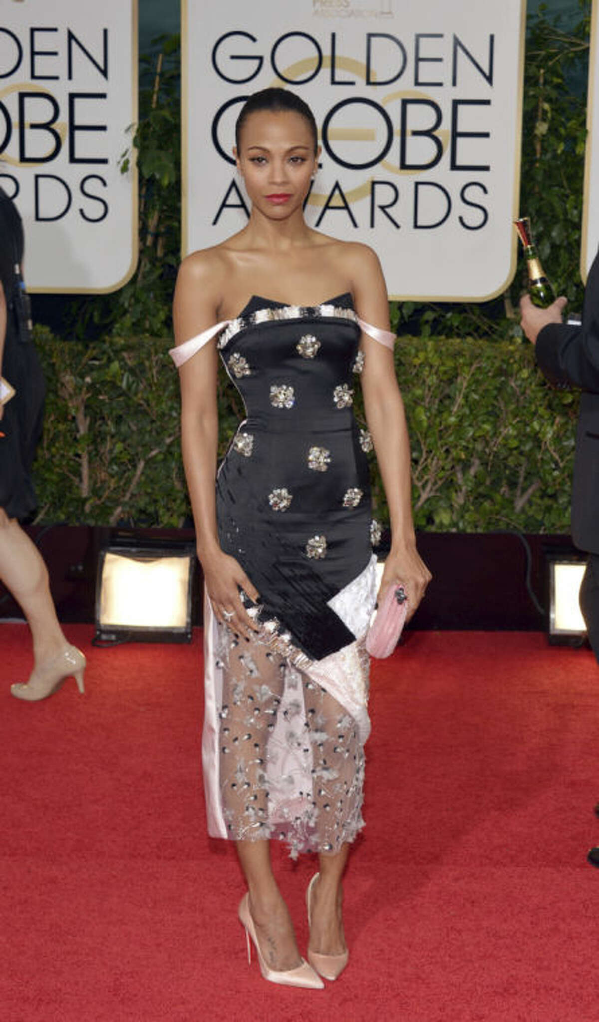 Zoe Saldana arrives at the 71st annual Golden Globe Awards at the Beverly Hilton Hotel on Sunday, Jan. 12, 2014, in Beverly Hills, Calif. (Photo by John Shearer/Invision/AP)