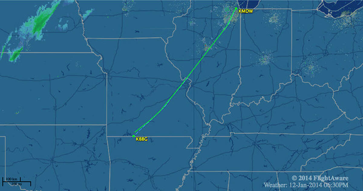 In this image released by FlightAware.com, the flight path of Southwest Airlines Flight 4013 on Sunday, Jan. 12, 2014, is shown. The Southwest Airlines flight, carrying 124 passengers and five crew members, was scheduled to go from Chicago's Midway International Airport to Branson Airport, in Branson, Mo., airline spokesman Brad Hawkins said Sunday in a statement. But the Boeing 737-700 landed at Taney County Airport about 7 miles away that only had about half as much runway. (AP Photo/Courtesy of FlightAware.com)