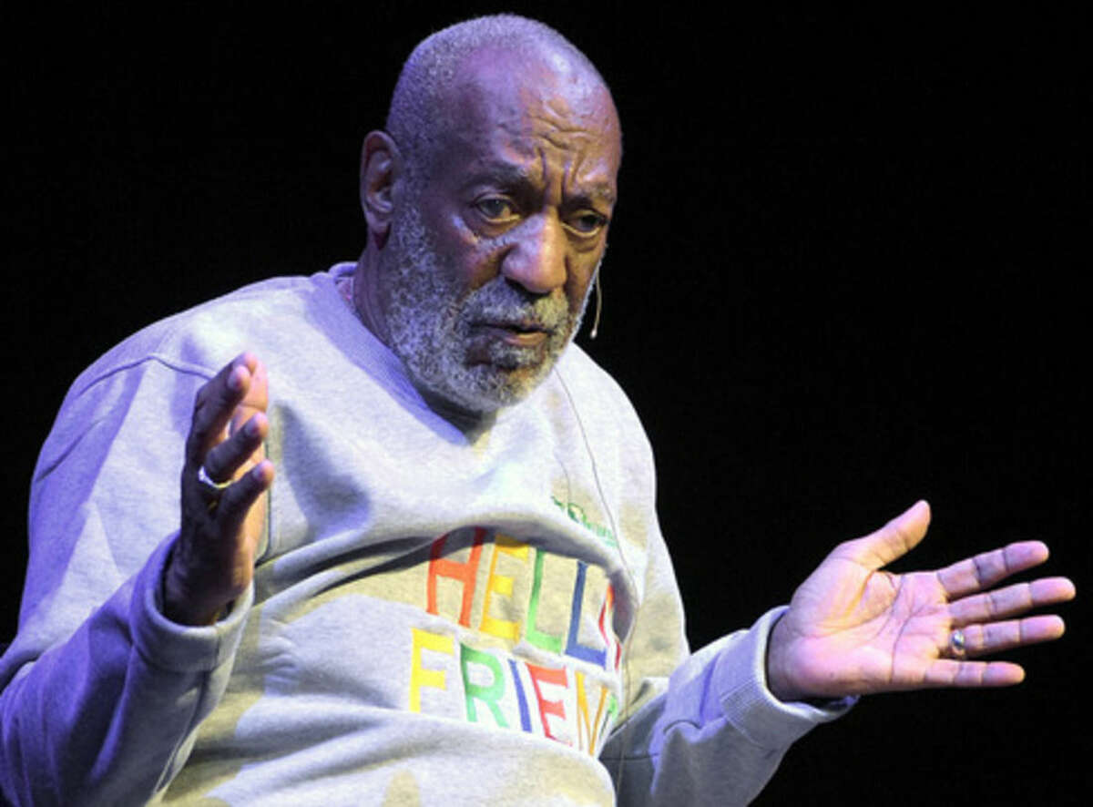 FILE - In this Nov. 21, 2014 file photo, comedian Bill Cosby performs during a show at the Maxwell C. King Center for the Performing Arts in Melbourne, Fla. Sexual assault allegations against Cosby are making it increasingly difficult for locals in a quaint western Massachusetts town to ignore their most famous resident, even if they try. Some shop owners in downtown Shelburne Falls say they’re weary of answering questions about the 78-year-old comedian, who they say never frequented their stores anyway. (AP Photo/Phelan M. Ebenhack, File)