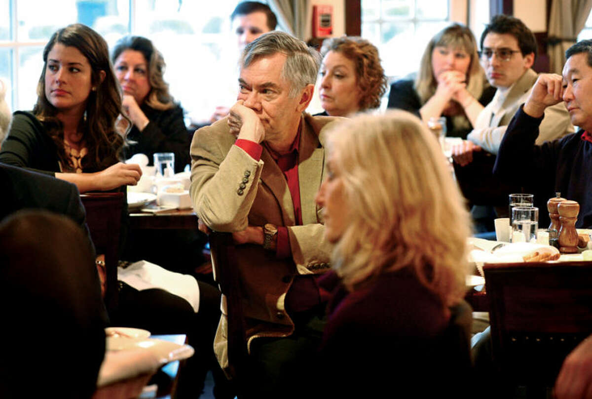 Hour photo / Erik Trautmann Chamber members listen to Dr. Nicholas Perna, Chief Economist of Webster Bank and this year's keynote speaker, at The Wilton Chamber of Commerce's "Economic Forecast Breakfast" Tuesday at Marly's Bistro.