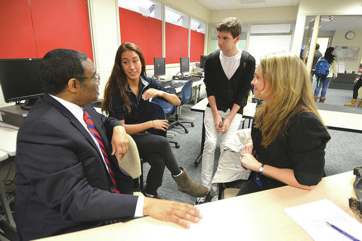 Hour Photo/Alex von Kleydorff Center for Youth Leadership Executive Commitee Members Melanie Patino and Nic Solano talk with State Rep. Bruce Morris and Love 146's Nicole von Oy about National Human Trafficking Awareness Month.