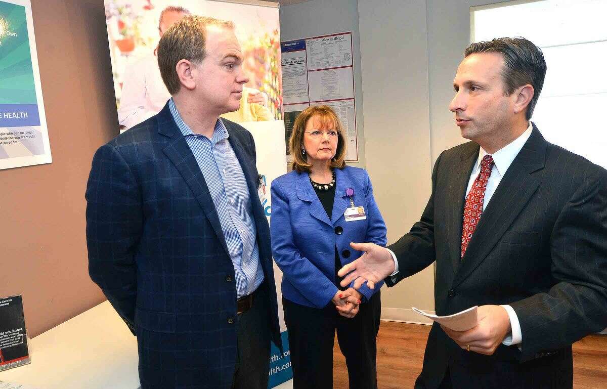 Hour Photo/Alex von Kleydorff State Senator Bob Duff talks with Sovereign Home Health President Syd Kain and Director of Case Management Linda Cammarota about the success and expansion of InvestCT at Sovereign Home Health, a small business located in Norwalk that has benefited from the program.