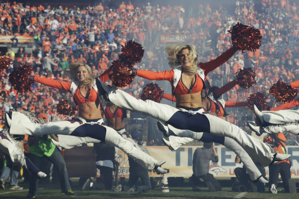 The Denver Broncos cheerleaders perform during the first half of