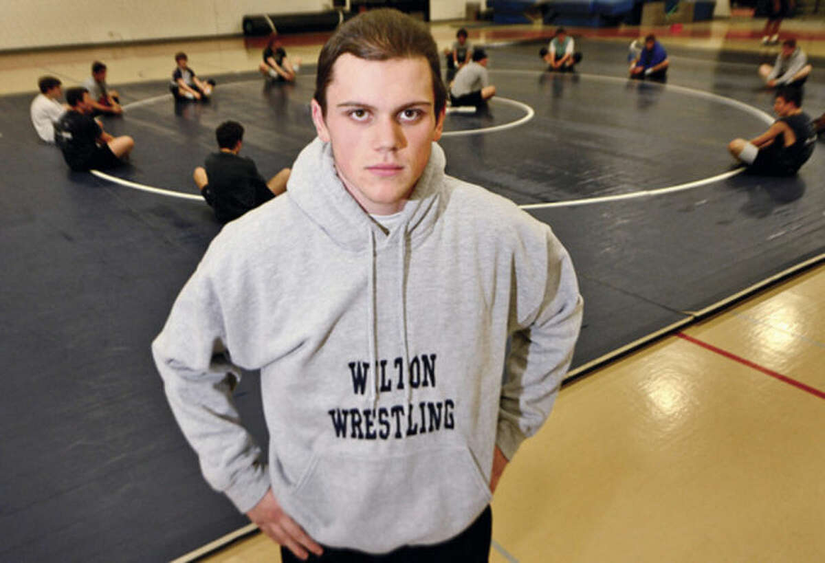 Hour photo / Erik Trautmann Wilton High School wrestler DANNY HOLLAND, this week's subject for On The Record.