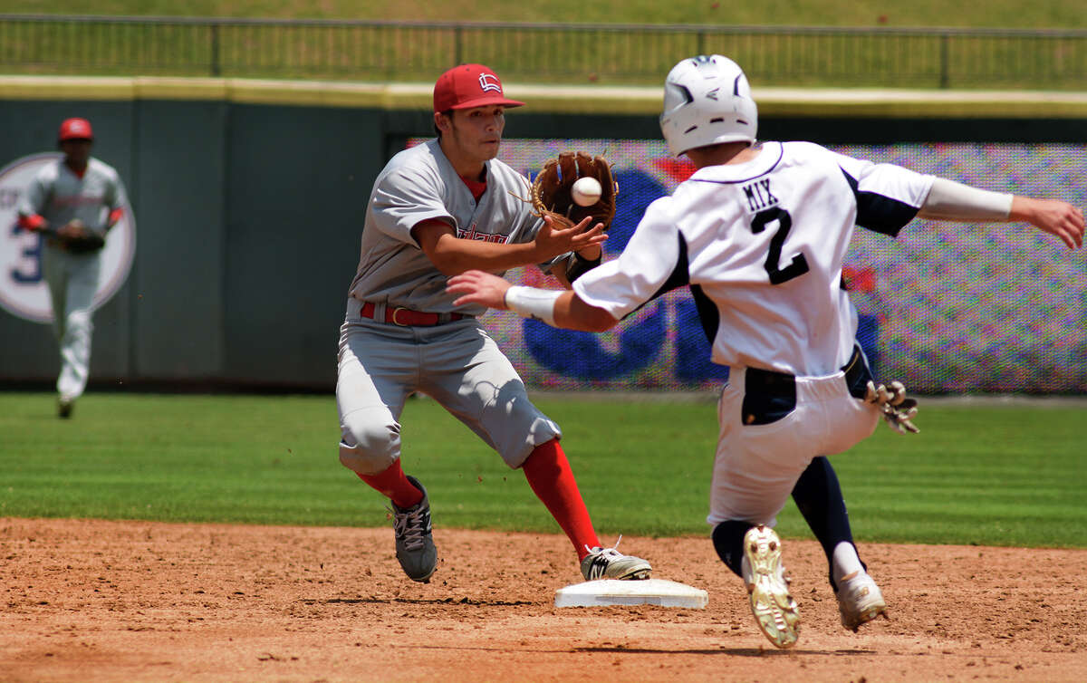Langham Creek junior shortstop Tommy Tolve, left, makes a play against Dallas Jesuit baserunner JT Mix in the bottom of the 3rd inning of their 2016 UIL Baseball State Championships semi-final matchup at Dell Diamond in Round Rock on Friday, June 10, 2016. (Photo by Jerry Baker/Freelance)