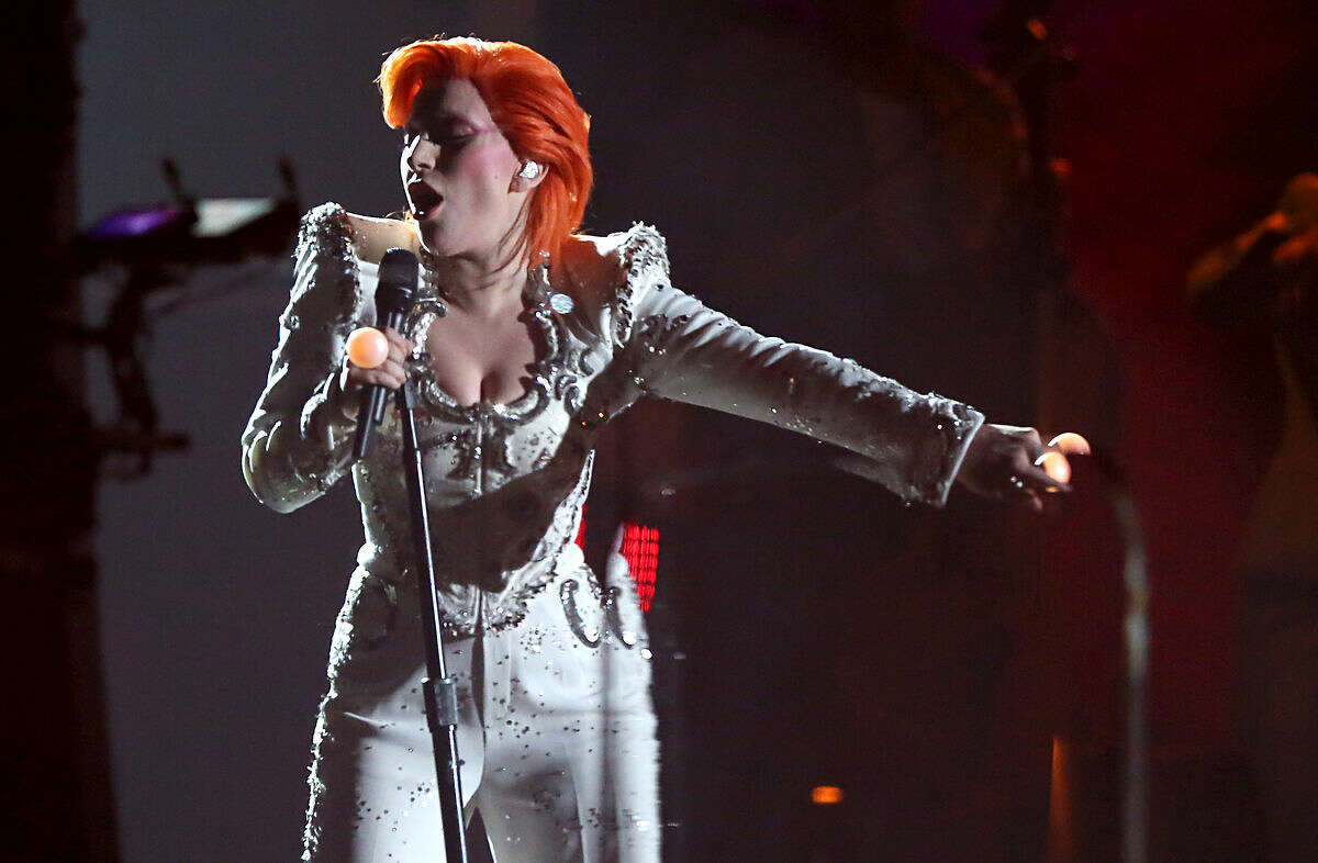 Lady Gaga performs a tribute to David Bowie at the 58th annual Grammy Awards on Monday, Feb. 15, 2016, in Los Angeles. (Photo by Matt Sayles/Invision/AP)