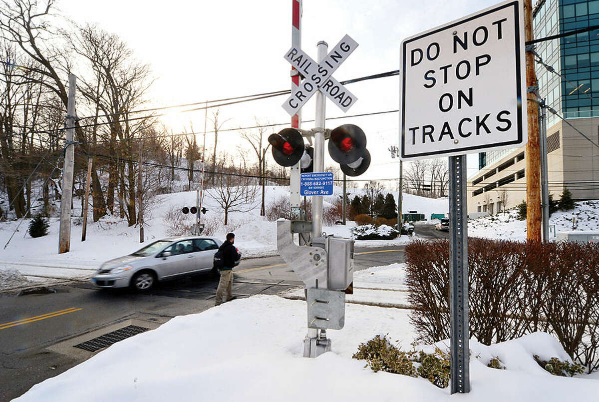 Hour photo / Erik Trautmann Railroad crossing at Glover St on the Danbury Line in Norwalk. Does Metro-North Railroad have safety measures in place along Danbury and New Canaan lines to prevent accidents at crossings like the one that ocurred Tuesday in Valhalla, NY?