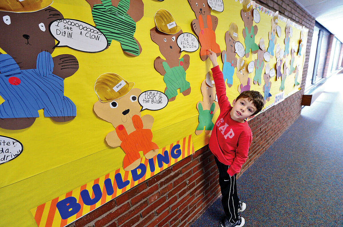 Miller-Driscoll School kindergartner Bryan Ennis and his classmates made crafts expressing what they thought of the ongoing construction and renovation at the school.