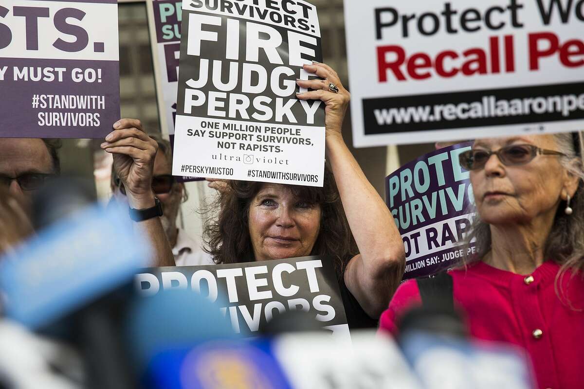 A woman attends a press conference held before the delivery of nearly one million signatures demanding the removal of Judge Aaron Persky to California Commission on Judicial Performance at the State of California Building in San Francisco, CA on June 10, 2016. Judge Persky has come under fire for giving what many consider a lenient sentence to Brock Turner, a convicted rapist.
