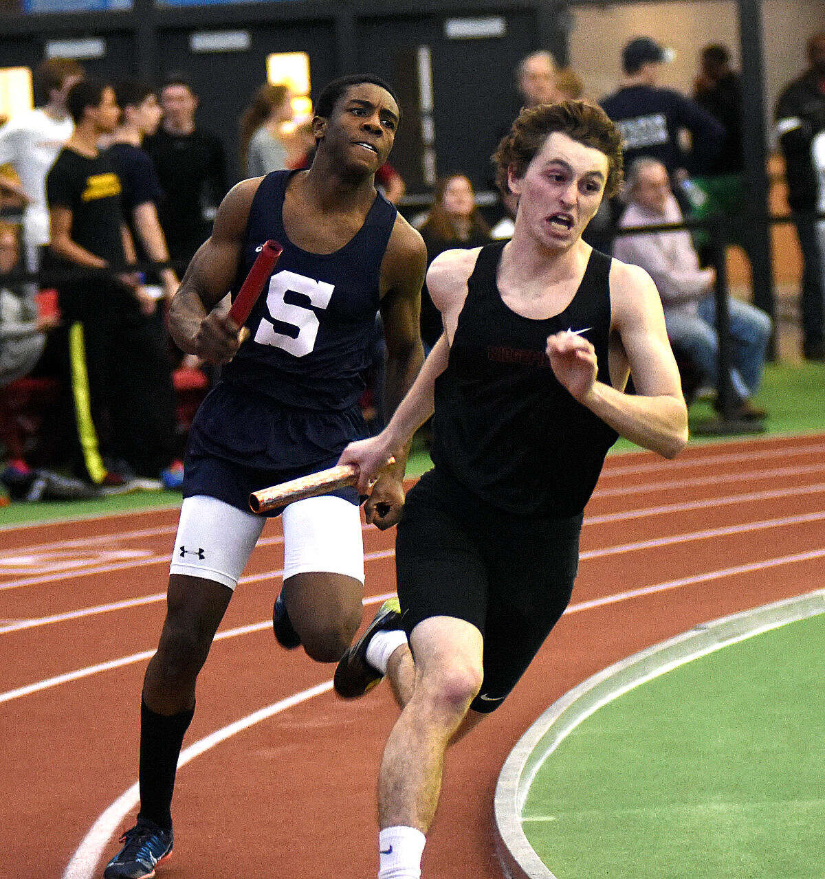 Hour photo/John Nash - Shots from Wednesday night's FCIAC Track and Field Championship meet held at The Floyd Little Center at Hillhouse High School in New Haven.