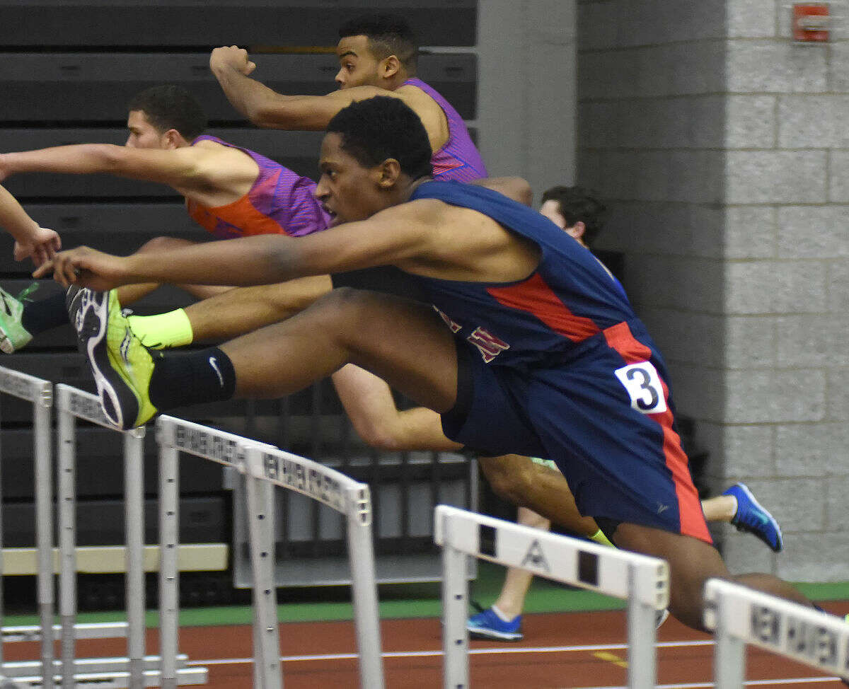 Hour photo/John Nash - Shots from Wednesday night's FCIAC Track and Field Championship meet held at The Floyd Little Center at Hillhouse High School in New Haven.