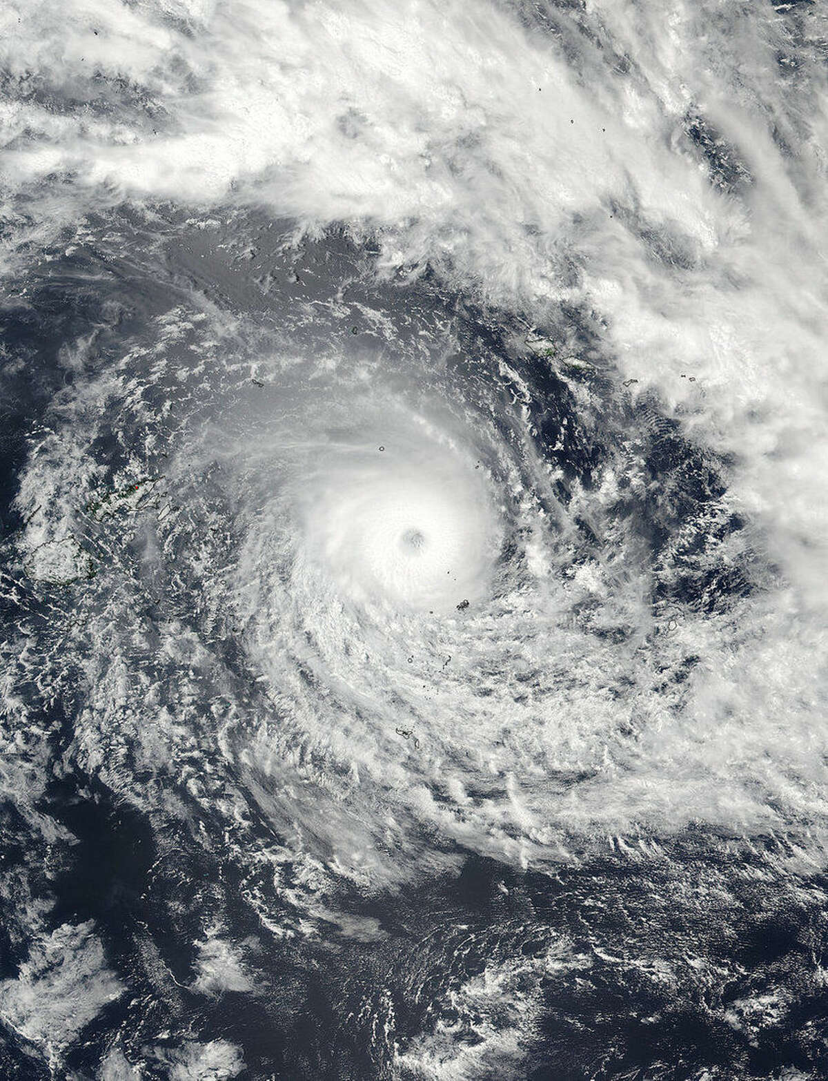 This Feb. 19, 2016, satellite image released by NASA Goddard Rapid Response shows Cyclone Winston in the South Pacific Ocean. The Pacific island nation of Fiji was hunkering down Saturday as a formidable cyclone with winds of 300 kilometers (186 miles) per hour bore down. (NASA Goddard Rapid Response/NOAA via AP)