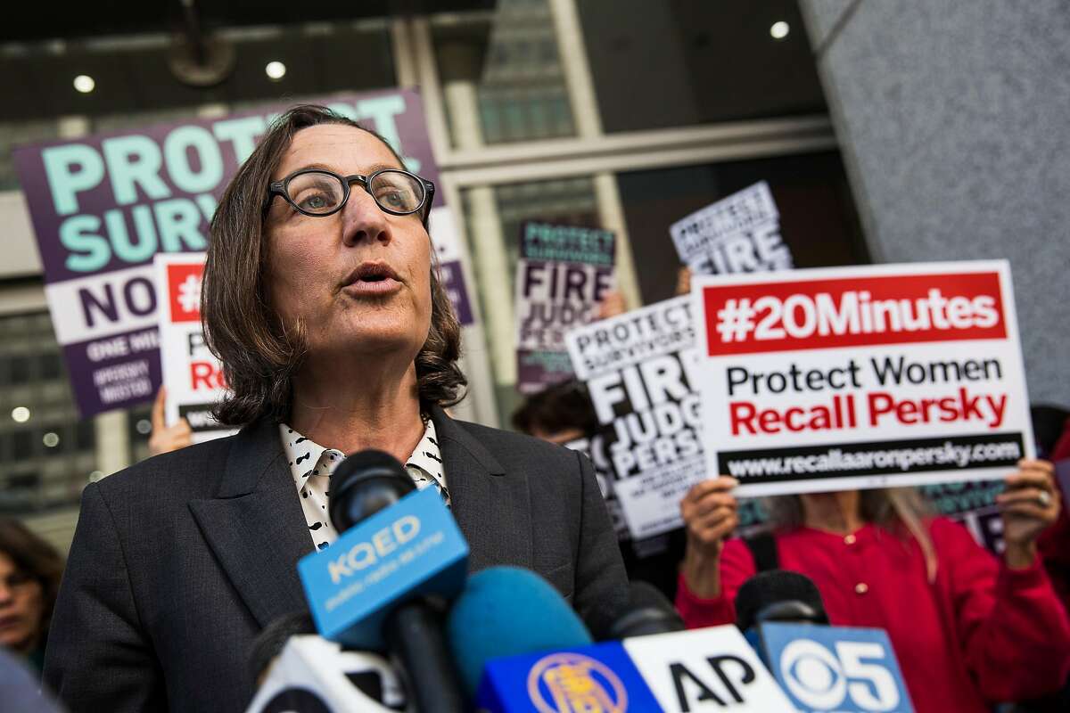 FILE-- Michele Landis Dauber, a law professor and sociologist at Stanford University, speaks at a press conference held before the delivery of nearly one million signatures demanding the removal of Judge Aaron Persky to California Commission on Judicial Performance at the State of California Building in San Francisco on June 10, 2016. Judge Persky has come under fire for giving what many consider a lenient sentence to Brock Turner, a convicted rapist.