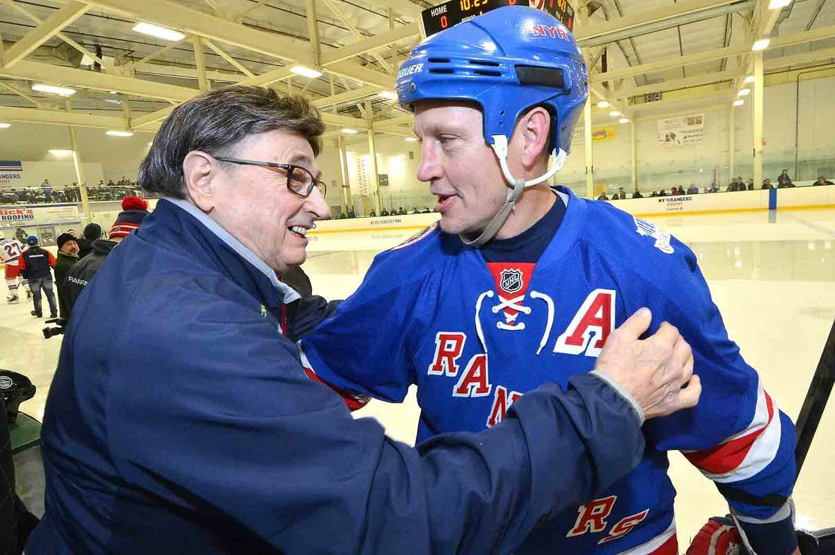 Hour Photo/Alex von Kleydorff Andre Dore and NY Rangers National Anthem Singer Joe Amirante as NY Rangers current players and alumni hold hockey clinics and take to the ice at SONO Ice House with 'NY Rangers Assist' program to benefit Hockey in Norwalk Foundation