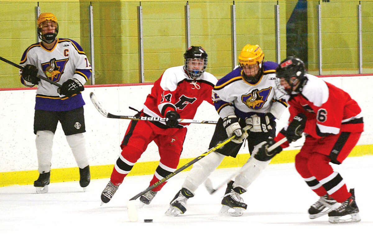 Hour photo / Erik Trautmann Westhill High School co op hockey team takes on Farfield Warde in their regular season FCIAC game Saturday at Terry Connors Rink in Stamford.