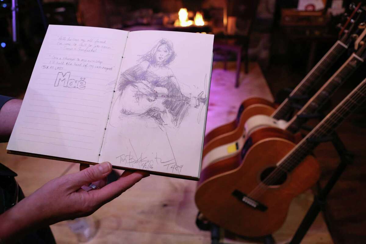 A performer from a previous music night as featured in the sketchbook along with notes and impressions of songs and music.