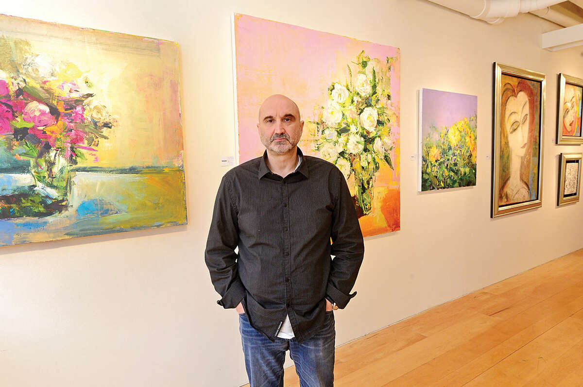 Hour photo / Erik Trautmann Claude Villani, owner of Galerie Sono, has reservations about unsanctioned public displays of artwork like what was seen this week in South Norwalk.
