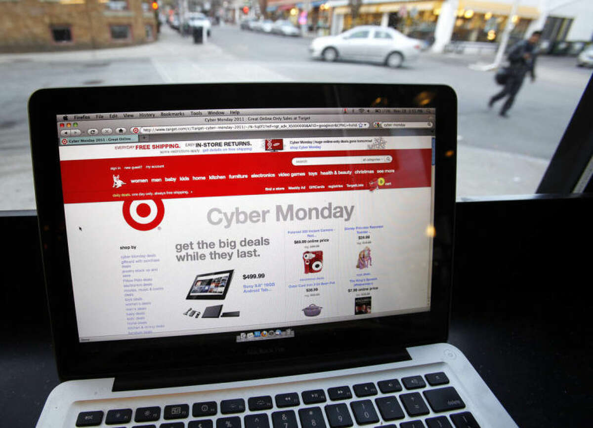 FILE - In this Monday, Nov. 28, 2011, file photo, the Target web site is photographed on a computer screen at a coffee shop in Providence, R.I.. American shoppers say they are very concerned about the safety of their personal information following a massive security breach at Target, but most aren?’t doing anything to ensure their data is secure, says a new Associated Press--GfK Poll released Monday, Jan. 27, 2014. (AP Photo/Michael Dwyer, File)