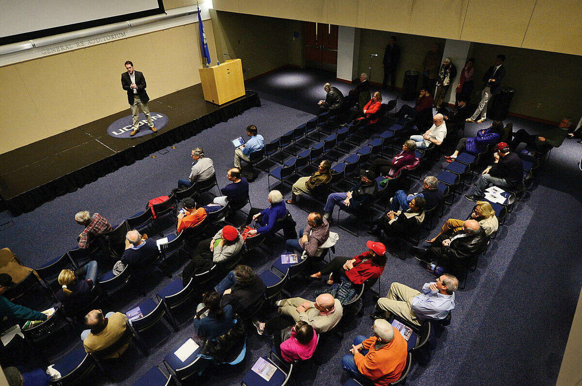 Congressman Jim Himes holds a town hall-style meeting at the the University of Connecticut's Stamford campus Saturday afternoon.