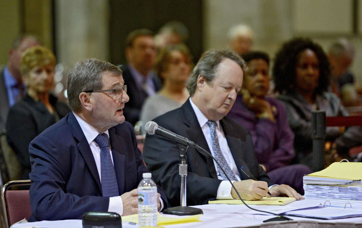 John Fletcher, left, Northrop Grumman Sperry Marine Global Service Manager, answers a question alongside his counsel, Don Haycraft, during a U.S. Coast Guard investigative hearing into the sinking of the El Faro in Jacksonville, Fla., Wednesday, Feb. 24, 2016. The 790-foot-long ship sank Oct. 1 after losing propulsion and getting overwhelmed by high winds from Hurricane Joaquin. (Bob Mack/The Florida Times-Union via AP) MANDATORY CREDIT