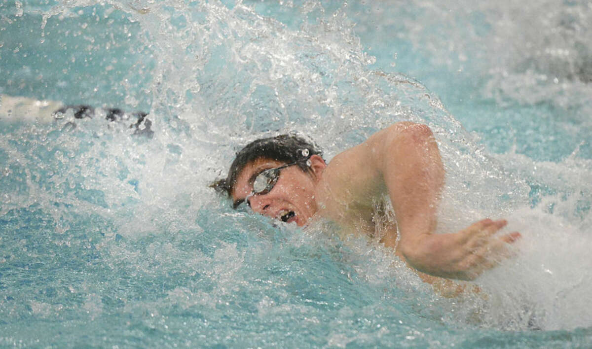 Hour photo/Alex von Kleydorff Staples' North Woods won the 200IM in 1:08.26 and nearly missed breaking the school record.