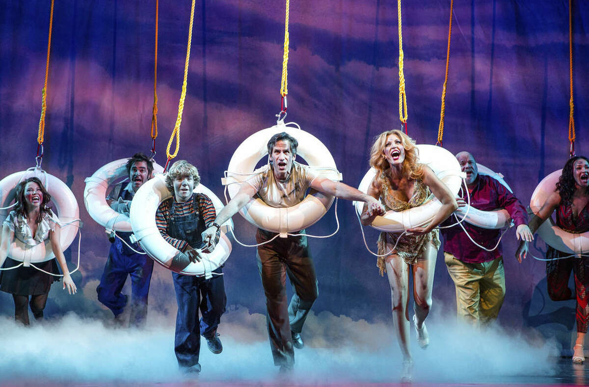 This image released by Polk and Co., shows cast members, from left, Catherine Ricafort, Roger Bart, Baylee Littrell, Seth Rudetsky, Rachel York, Kevin Chamberlain and Olivia Phillip during a performance of, "Disaster!." Littrell, the son of model and actress Leighanne Littrell and Brian Littrell, a member of the Backstreet Boys, is making his Broadway debut in the musical opening Thursday. (Jeremy Daniel/Polk and Co. via AP)