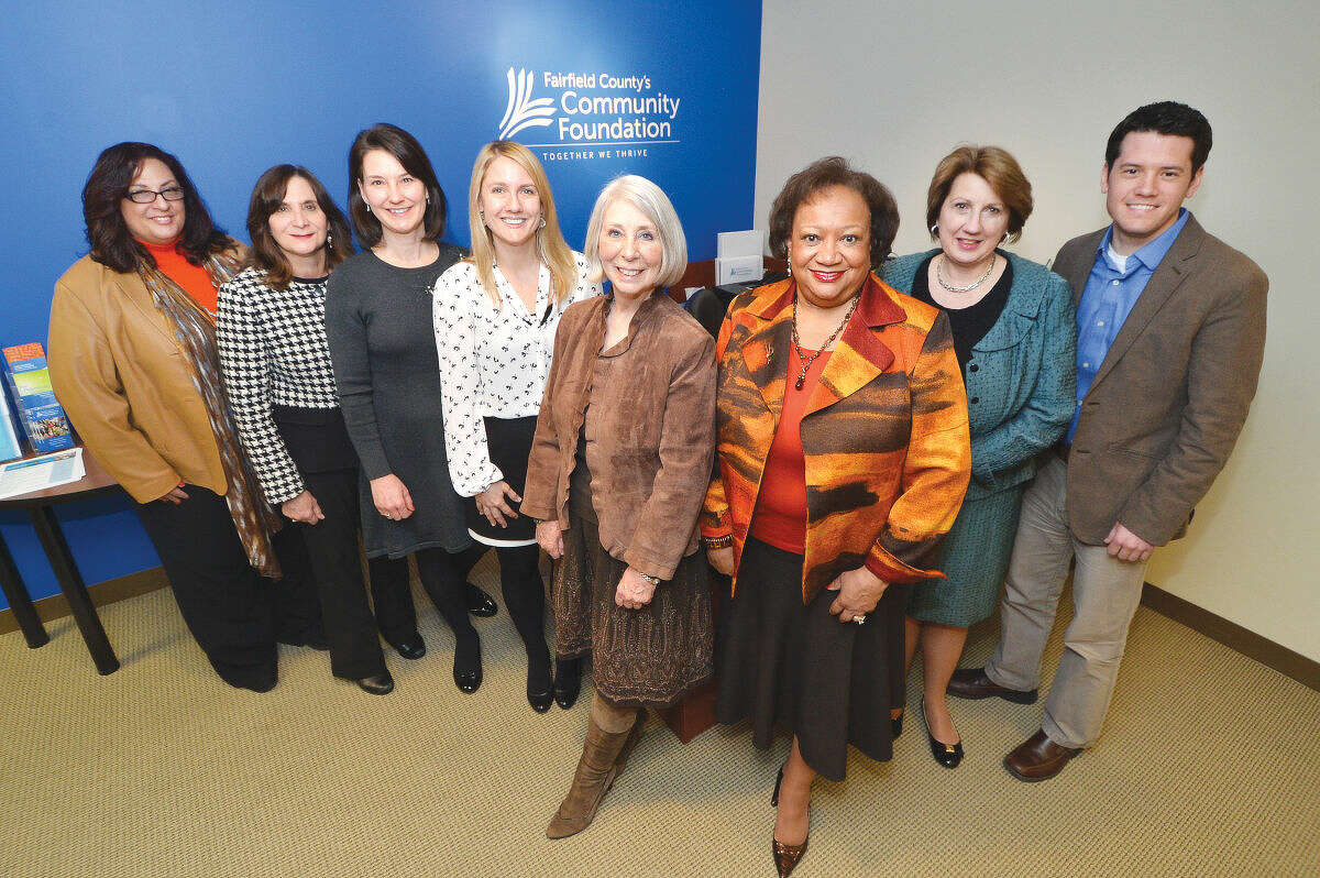 Fairfield County's Community Foundation giving group, from left to right: Marie Prosenti, office administrator, Carloe Schwartz, corporate and foundation relations manager, Elaine Mintz, director, Kristy Jelenik, development manager, Fiona Hodgson, vice president of development and marketing, Juanita James, president & CEO, Carol Heller, senior vice president, market manager enterprise business and community engagement, Bank of America, RJ Mercede M.S., Center for Nonprofit Excellence associate.