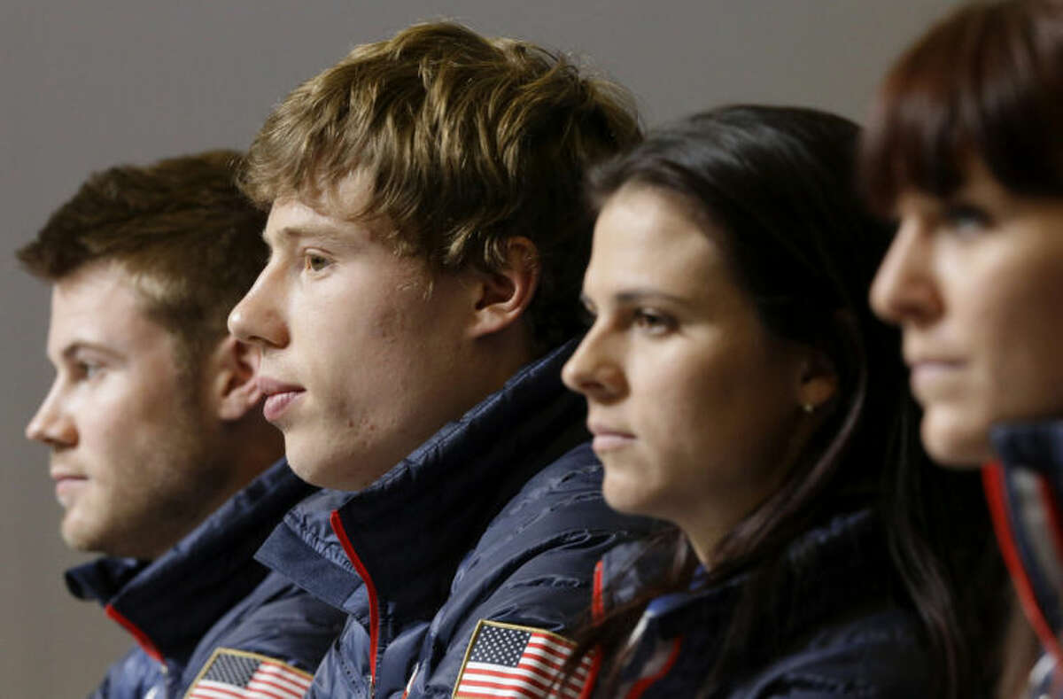 U.S. speedskaters Joey Mantia, from left, Brian Hansen, Brittany Bowe and Heather Richardson listen to a reporter's question during a 2014 Winter Olympics news conference, Thursday, Feb. 6, 2014, in Sochi, Russia. (AP Photo/Patrick Semansky)
