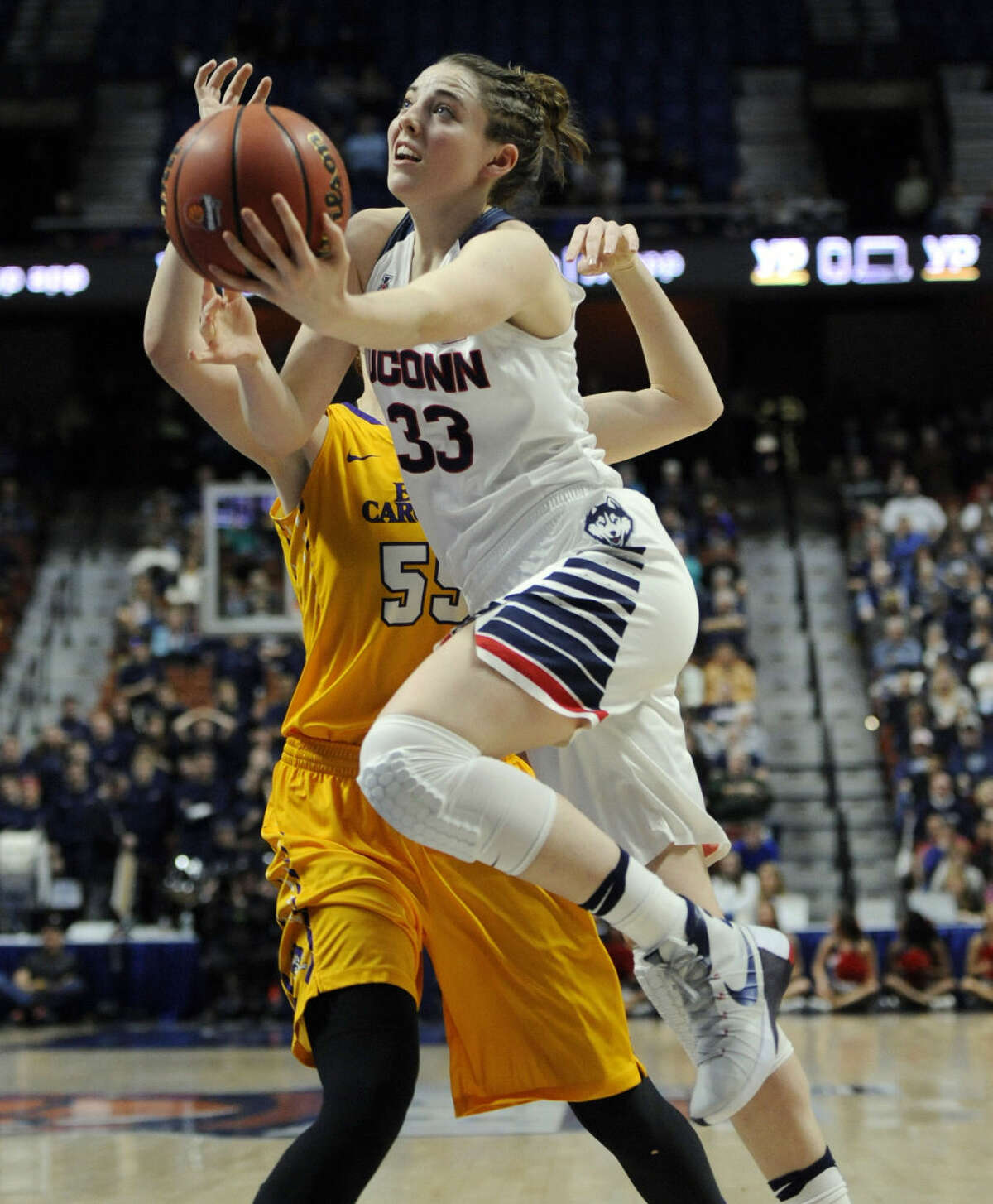 Connecticut’s Katie Lou Samuelson drives to the basket around East Carolina’s Marina Laramie, back, during the first half of an NCAA college basketball game in the American Athletic Conference tournament quarterfinals at Mohegan Sun Arena, Saturday, March 5, 2016, in Uncasville, Conn. (AP Photo/Jessica Hill)