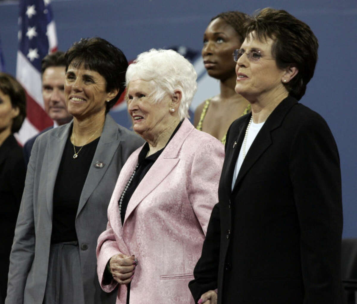 FILE - In this Aug. 28, 2006 file photo, Billie Jean King stands with her mother, Betty Moffitt, center, and girlfriend Ilana Kloss, left, during the dedication ceremony for the USTA National Tennis Center, re-named in King's honor, at the U.S. Open tennis tournament in New York. Moffitt, the mother of Billie Jean King and former major league pitcher Randy Moffitt, has died in Prescott, Ariz. She was 91. King's publicist says she died Friday, Feb. 7, 2014, at home with her children by her side. (AP Photo/Elise Amendola, File)