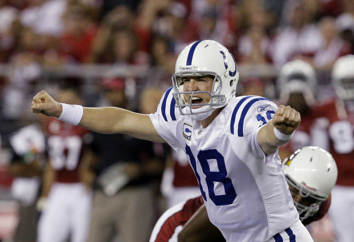 FILE - In this Sept. 27, 2009, file photo, Indianapolis Colts' Peyton Manning shouts signals to teammates as they play the Arizona Cardinals in the second quarter of a football game in Glendale, Ariz. A person with knowledge of the decision tells The Associated Press on Sunday, March 6, 2016, that Manning has informed the Denver Broncos he's going to retire. (AP Photo/Ross D. Franklin, File)