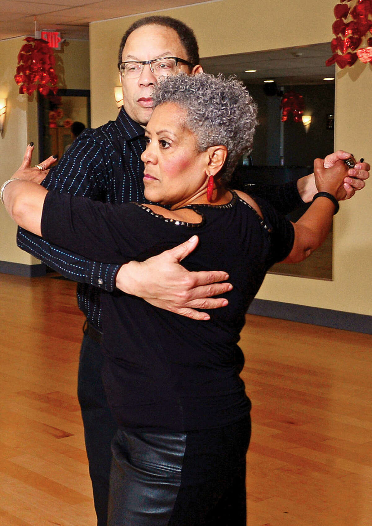 Hour photo / Erik Trautmann Norwalk residents Chuck and Cheryl Presbury have been married for 30 years and ballroom dancing at Fred Astaire Dance Studio in Norwalk for the last five.