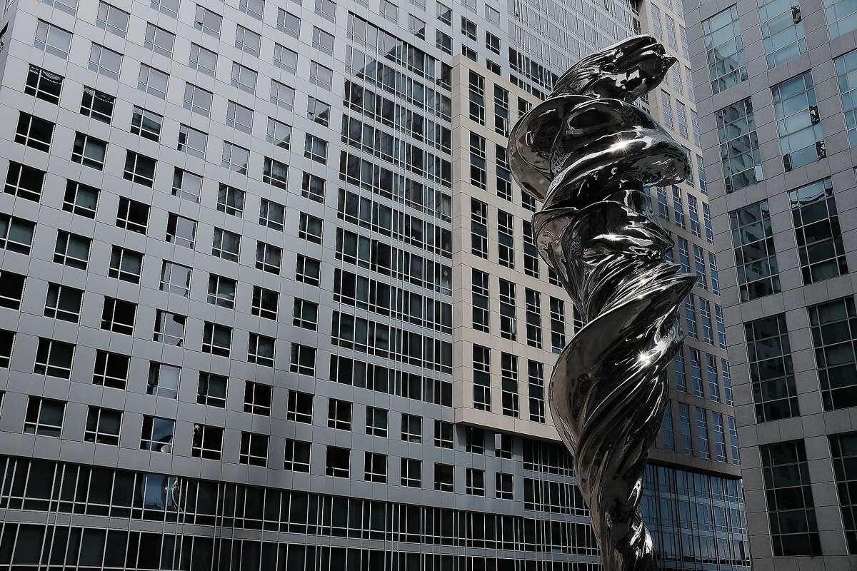 The newly completed sculpture "Venus," depicting goddess of love and beauty wrapped in a flowing robe, stands in Trinity Place in San Francisco. The 92-foot-tall work is by Lawrence Argent.