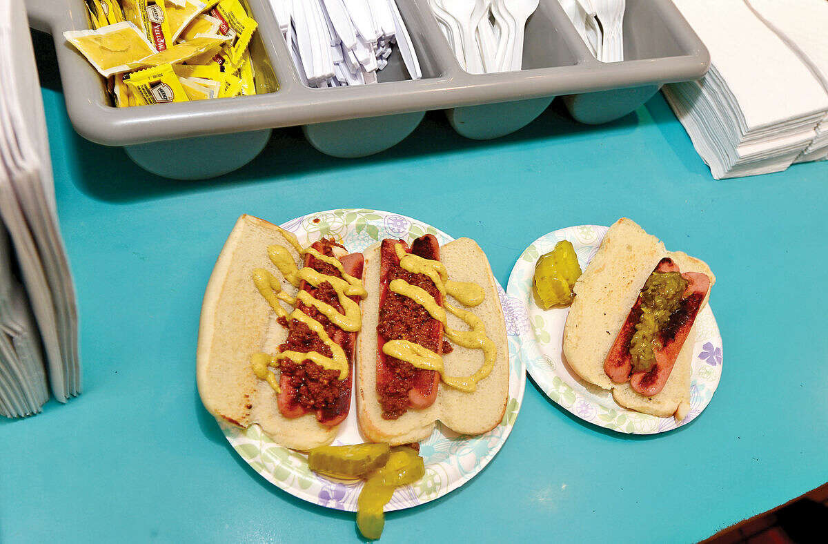 Hour photo / Erik Trautmann Chili dogs are a customer favorite at Pat’s Hubba Hubba which is closing down Sunday after nearly 50 years of operation.