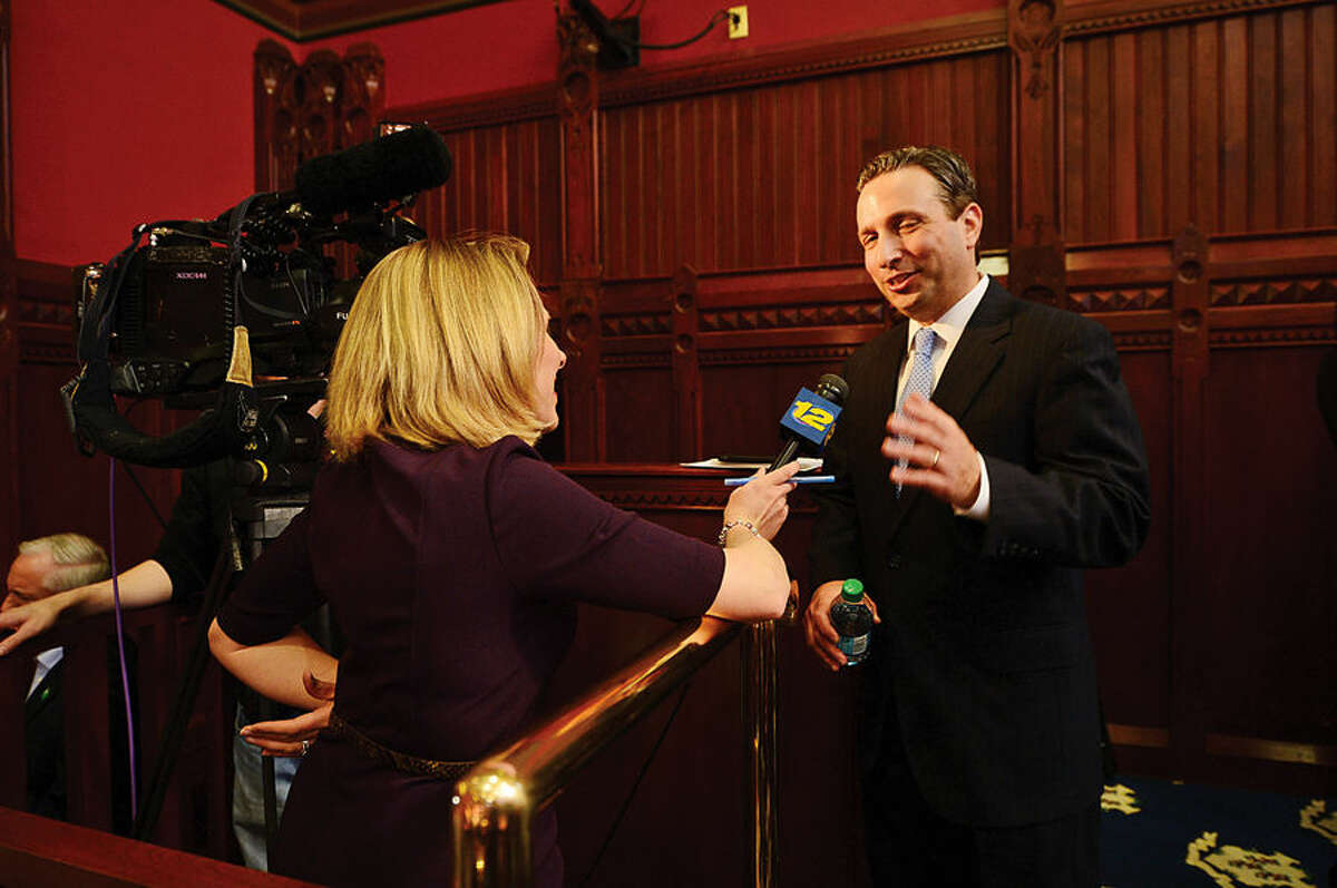 Hour photo / Erik Trautmann New Senate Majority Leader Bob Duff (D-25) is interviewed by the press following the joint legislative session and gubenatorial budget address wednesday in Hartford