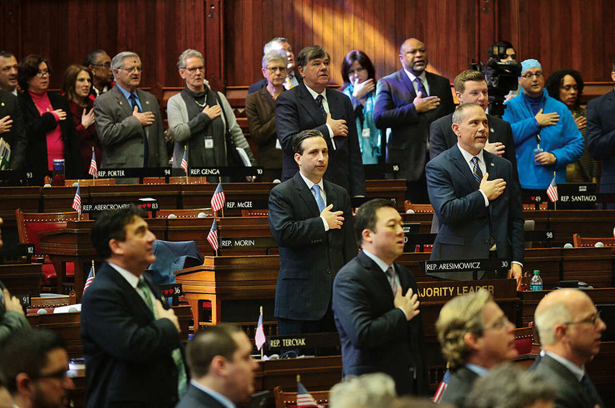 Hour photo / Erik Trautmann Bob Duff (D-25) conducts business as new Senate Majority Leader in the joint legislative session and gubenatorial budget address Wednesday in Hartford