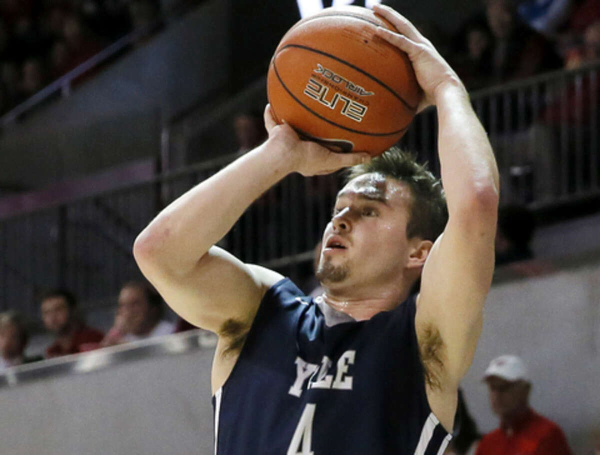 FILE - In this Nov. 22, 2015 file photo, Yale's Jack Montague attempts a shot during an NCAA college basketball game against SMU in Dallas. Expelled Yale player Montague, dismissed in February 2016 because of a sexual assault allegation, was in the stands Thursday, March 17, watching the Bulldogs take on Baylor in the NCAA Tournament in Providence, R.I. (AP Photo/Tony Gutierrez, File)