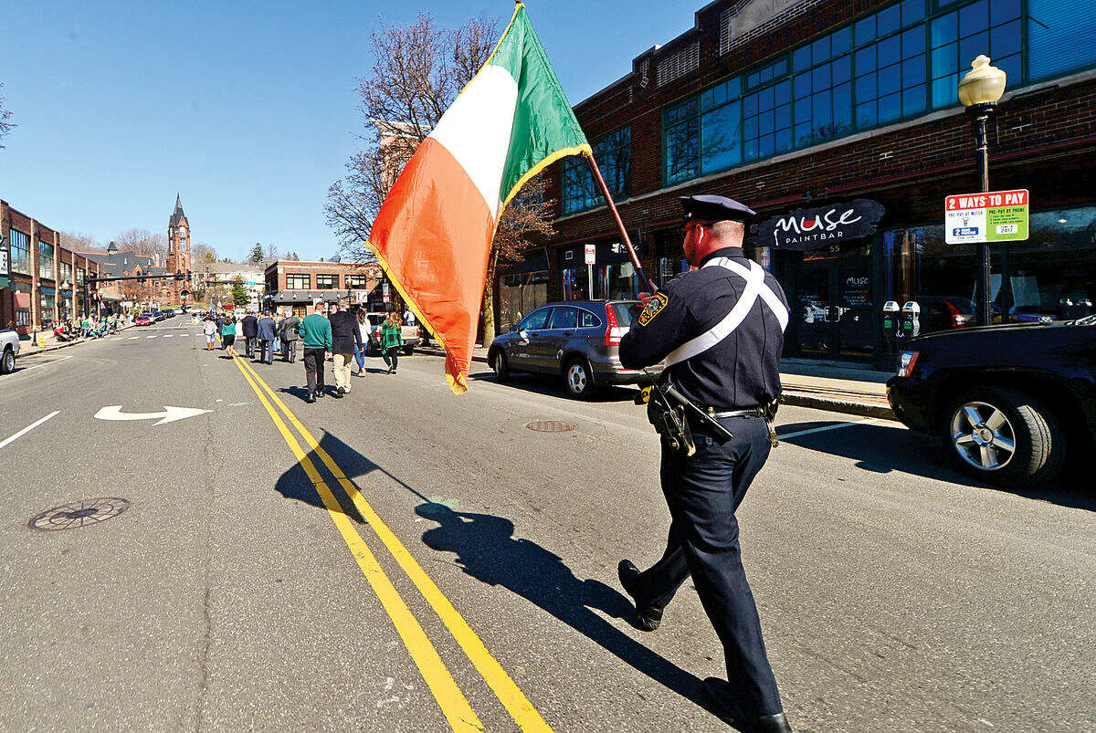 Hour photo / Erik Trautmann The Norwalk Police Emerald Society organized the first Norwalk St. Patrick's Day parade Thursday which made it's way down South and North Main Streets ending at O'Neill's Pub.
