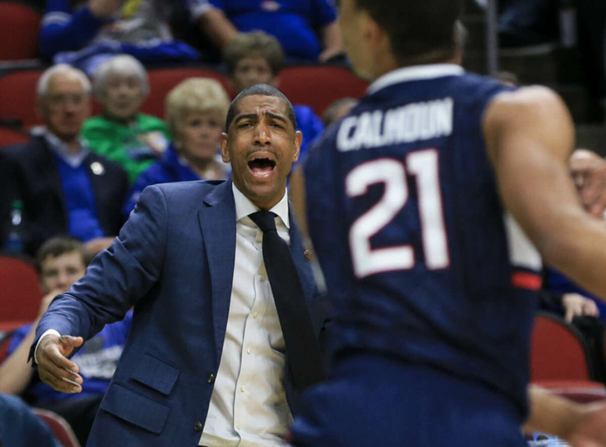 Connecticut coach Kevin Ollie shouts instructions during a first-round men's college basketball game against Colorado in the NCAA Tournament in Des Moines, Iowa, Thursday, March 17, 2016. (AP Photo/Nati Harnik)